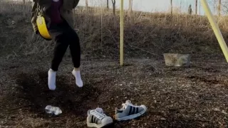 Playing on the Swing with Adidas Superstars and water