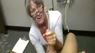 Horny Granny Tugging Cock For This Very Lucky Guy