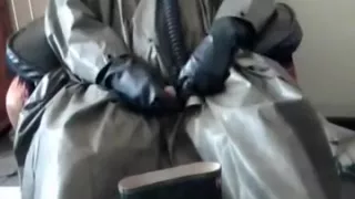 Wanking in tatty rubber poncho and even tattier rubber waders.