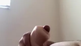 Chubby male beats his meat with a fake pussy and cums