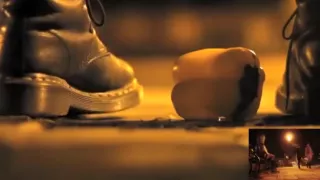 POV crushing of capsicum in shiny Doc Martens combat boots