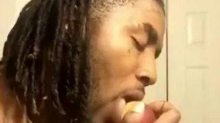 Guy tongue fucking a peach