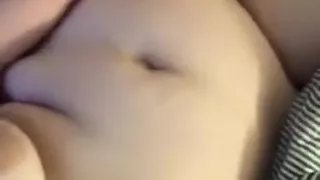 Holding the vibrator to my clit and orgasming despite extreme sensitivity