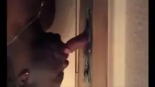 Black guy sucking off big white cock at gloryhole