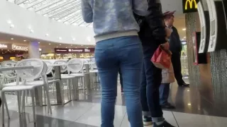 Sweet brunette with ass in tight jeans