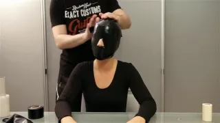 Gagged, taped, hooded and encased