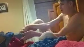 Gorgeous gay boy cums fingering his tight ass on cam