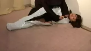 Japanese woman mummified and cleave gagged