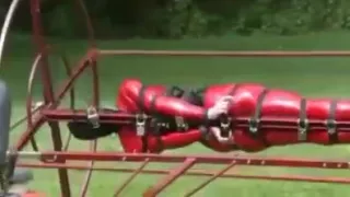 Bizarre ride for latex slave
