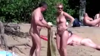 Nude beach - pointy little tits babe - embarrassed