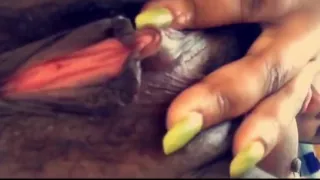 Ebony babe fingers juicy pussy