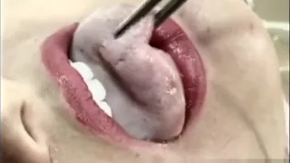 Crazy Asian chick with a latex fetish blows a black rod and is nailed