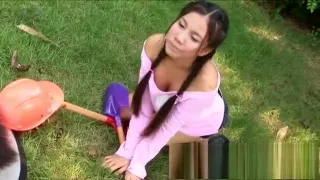 Pretty teen with pigtails shows off her splendid curves in the garden