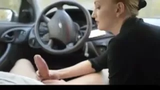 Juicy girl giving an amazing handjob in car