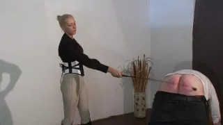 slave gets caned by strict blonde mistress