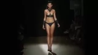 Watch her strut oiled fetish fashion models