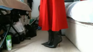 Red midi skirt and pointed italian thigh high boots