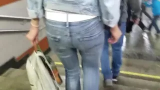 junior woman wriggle ass in tight jeans