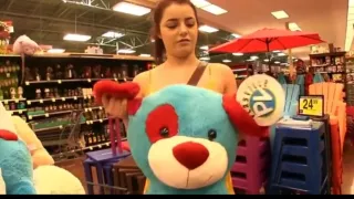 junior couple playing in store