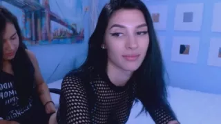 Lovely Lesbian Kissing While Rubbing Their Pussy