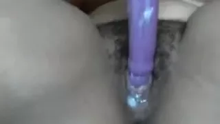 Hairy ebony bbw stuffs her creamy snatch