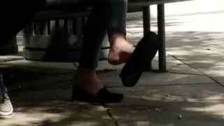 Candid feet dangle
