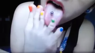 Cutie in glasses sucking her toes