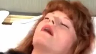 Two girls enjoying double fisting redhead