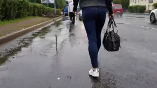 Small sexy wriggle ass in the street after rain