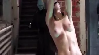 Naked woman whipped