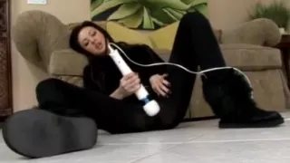 college girl in spandex playing with toy