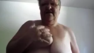 Horny grandma masturbating with dildo