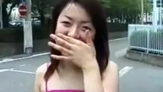 Shy japanese girl slowly gets naked in public
