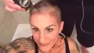 sexy girl with tatoos gets buzzed