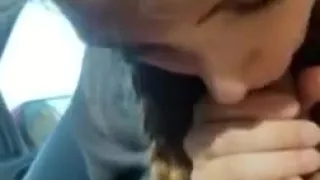 Blonde college girl with braids sucks cock in the car