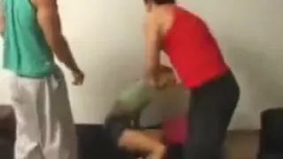 Two men trample a helpless girl under their feet