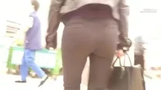 Brunette with good ass in leather jacket