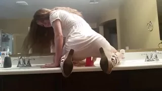 cute riding dildo in front of mirror