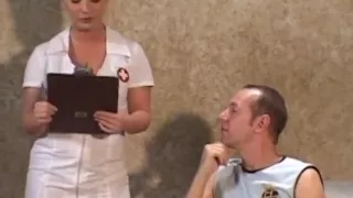 Sexy nurse helps out her patient