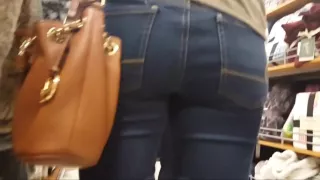 Candid college girl shopping with mom