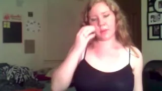 Redhead with big juggs helps herself out with blue dildo