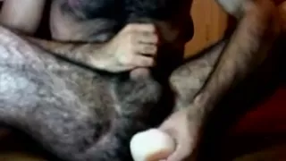 Hairy guy and his dildo