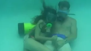 Scuba pool handjob