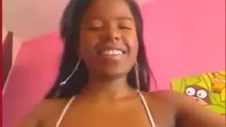 Black girl teases with huge boobs in white top