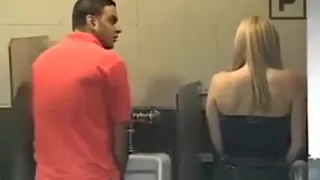 Chick peeing in the men's room