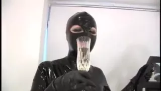 Two females latex strapon femdom