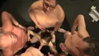 A bunch of horny old guys and a girl !!!