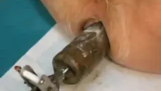 Inserting two realistic dildos