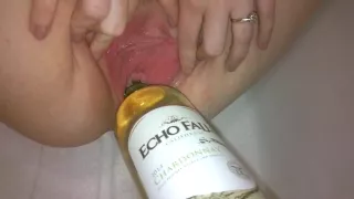 Inserting a open bottle of wine