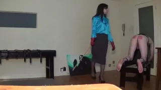 Miss Sultrybelle administers 70 strokes.